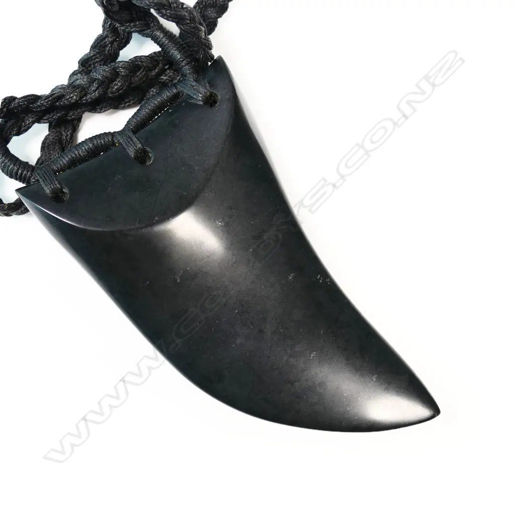 Te Kaha large carved pounamu rei niho (eye tooth) pendant, Image 1++